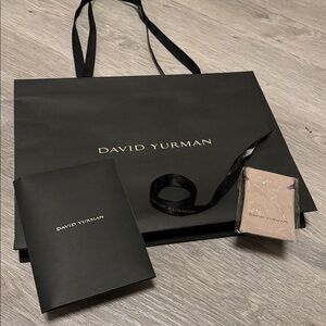 David Yurman gift set: bag, ribbon, envelope, polish cloth, dust bag, card.